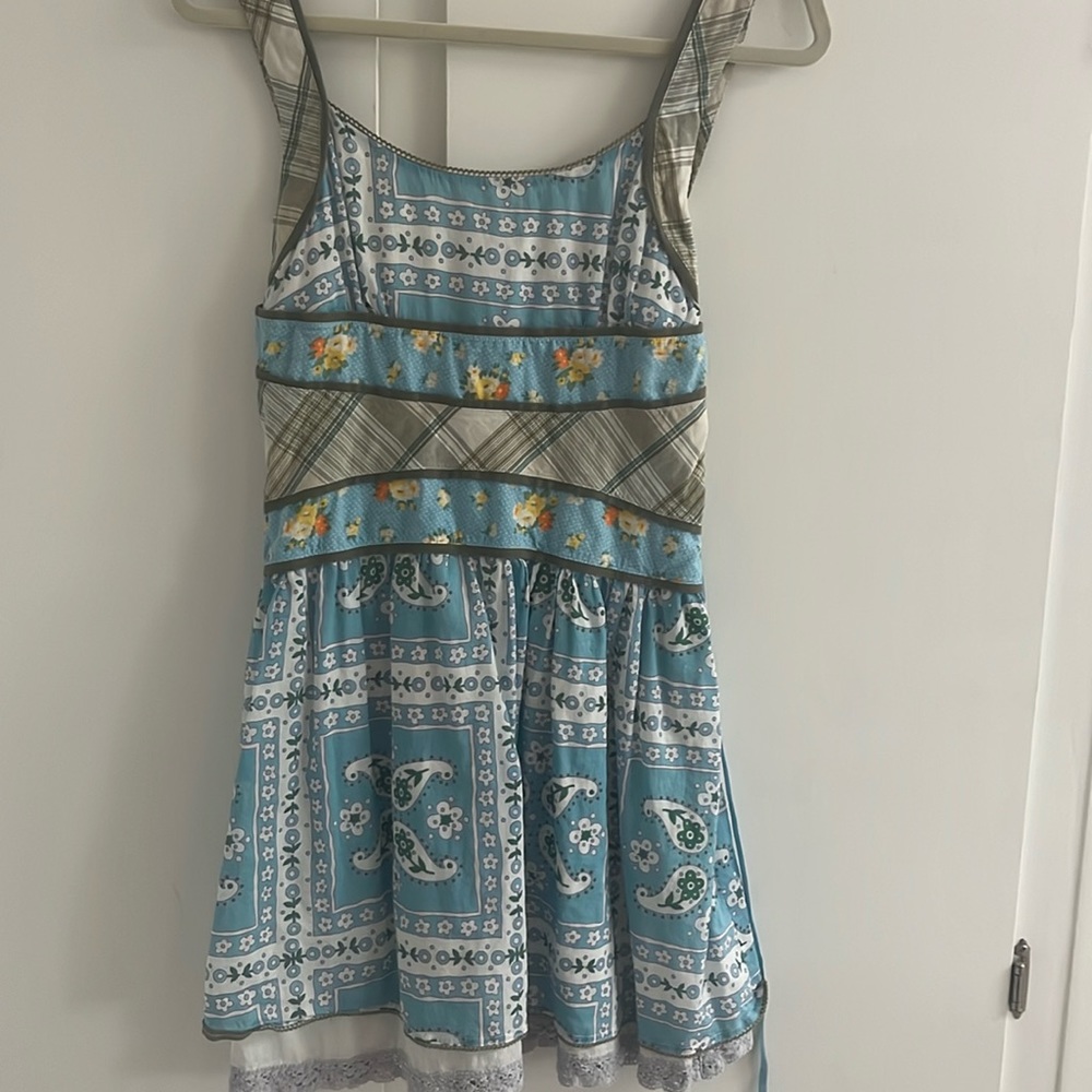Preowned women’s multicolor free people dress. Size 6.